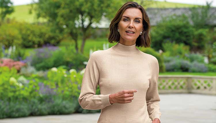 Lady Wearing Expensive Beige Wool Jumper 